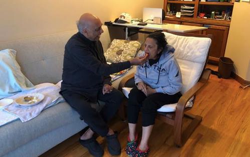 K.C. Mehta feeding his wife, Sumi